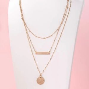NWT Pendant and Bar layered necklace gold colored
